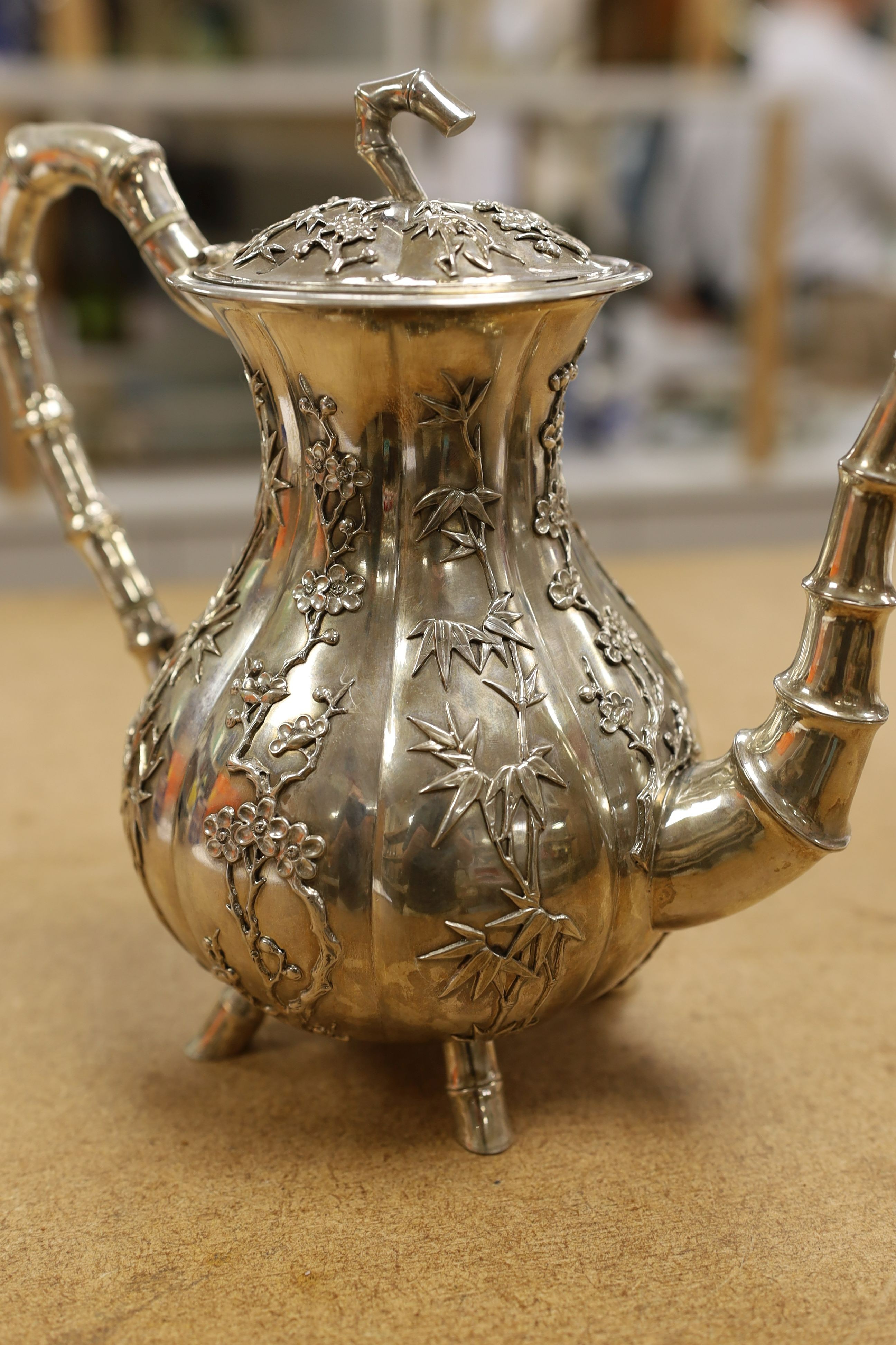 A late 19th/early 20th century Chinese Export white metal coffee pot by Hung Chong, height 20.3cm, gross weight 23.5oz.